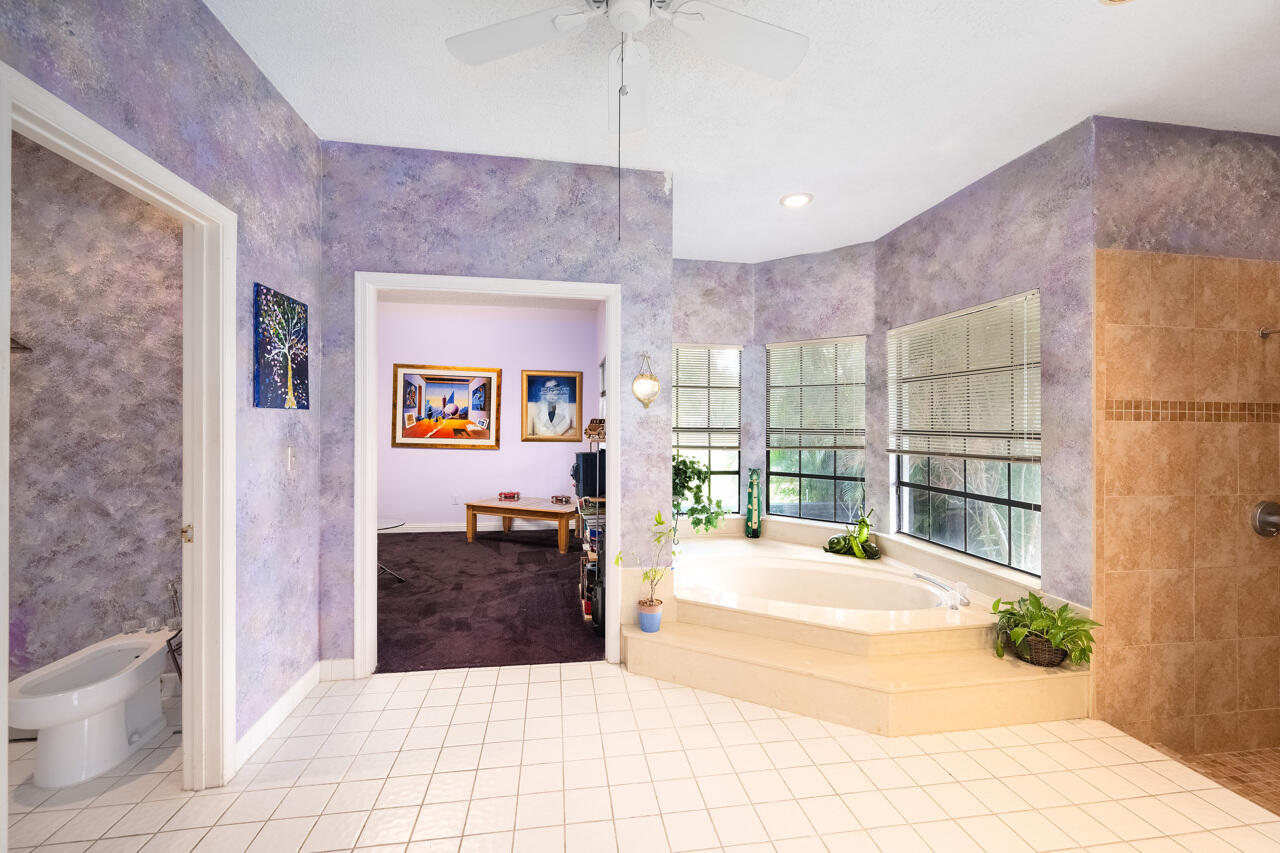 3740 Canterbury Way Boca Raton, FL 33434 - Photo 25 of 55 a room with a cabinets and a view of living room