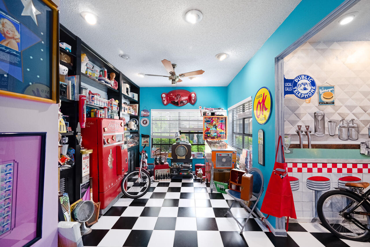 3740 Canterbury Way Boca Raton, FL 33434 - Photo 31 of 55 a very nice looking room with lots of stuff and white walls