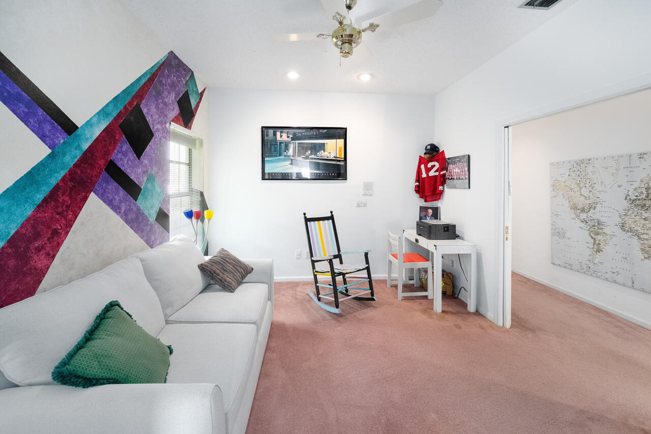 3740 Canterbury Way Boca Raton, FL 33434 - Photo 38 of 55 a living room with furniture and a couch