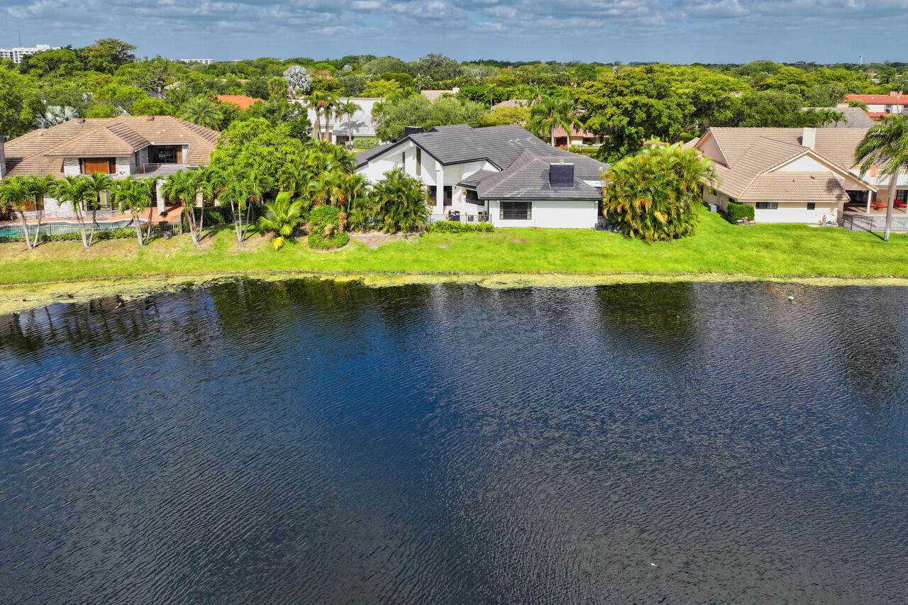3740 Canterbury Way Boca Raton, FL 33434 - Photo 48 of 55 an aerial view of a house with a yard basket ball court and outdoor seating