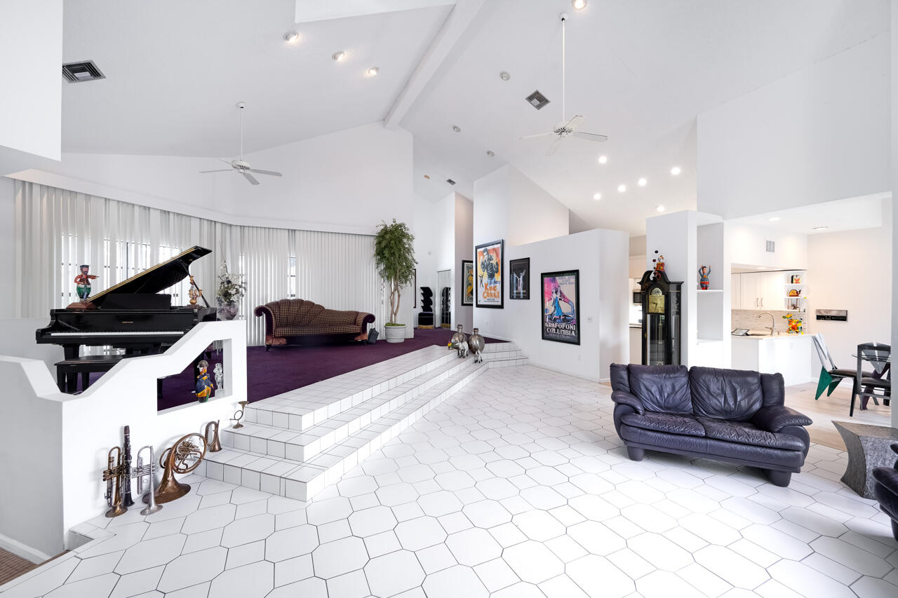 3740 Canterbury Way Boca Raton, FL 33434 - Photo 6 of 55 a living room with furniture and wooden floor