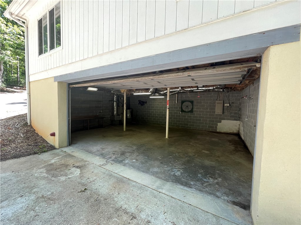 485 Mountain Rest Lake Road Mountain Rest, SC 29664 - Photo 35 of 45 Huge lower level garage with seperate door entrance.