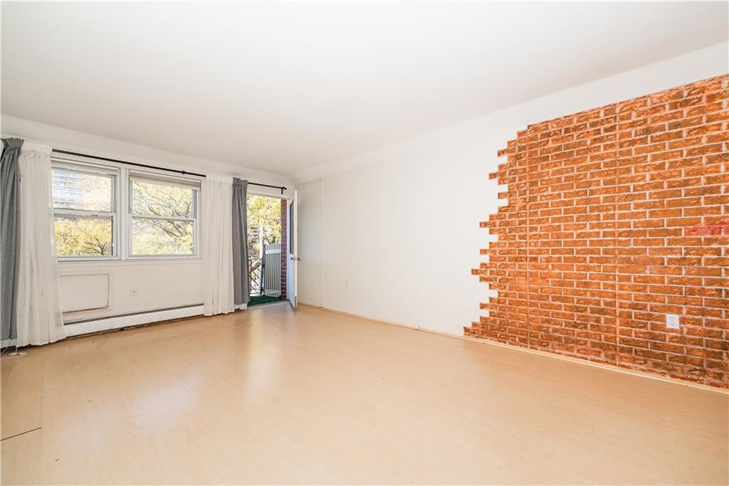 2963 Ocean Parkway, Unit 3F Brooklyn, NY 11235 - Photo 9 of 16 an empty room with windows