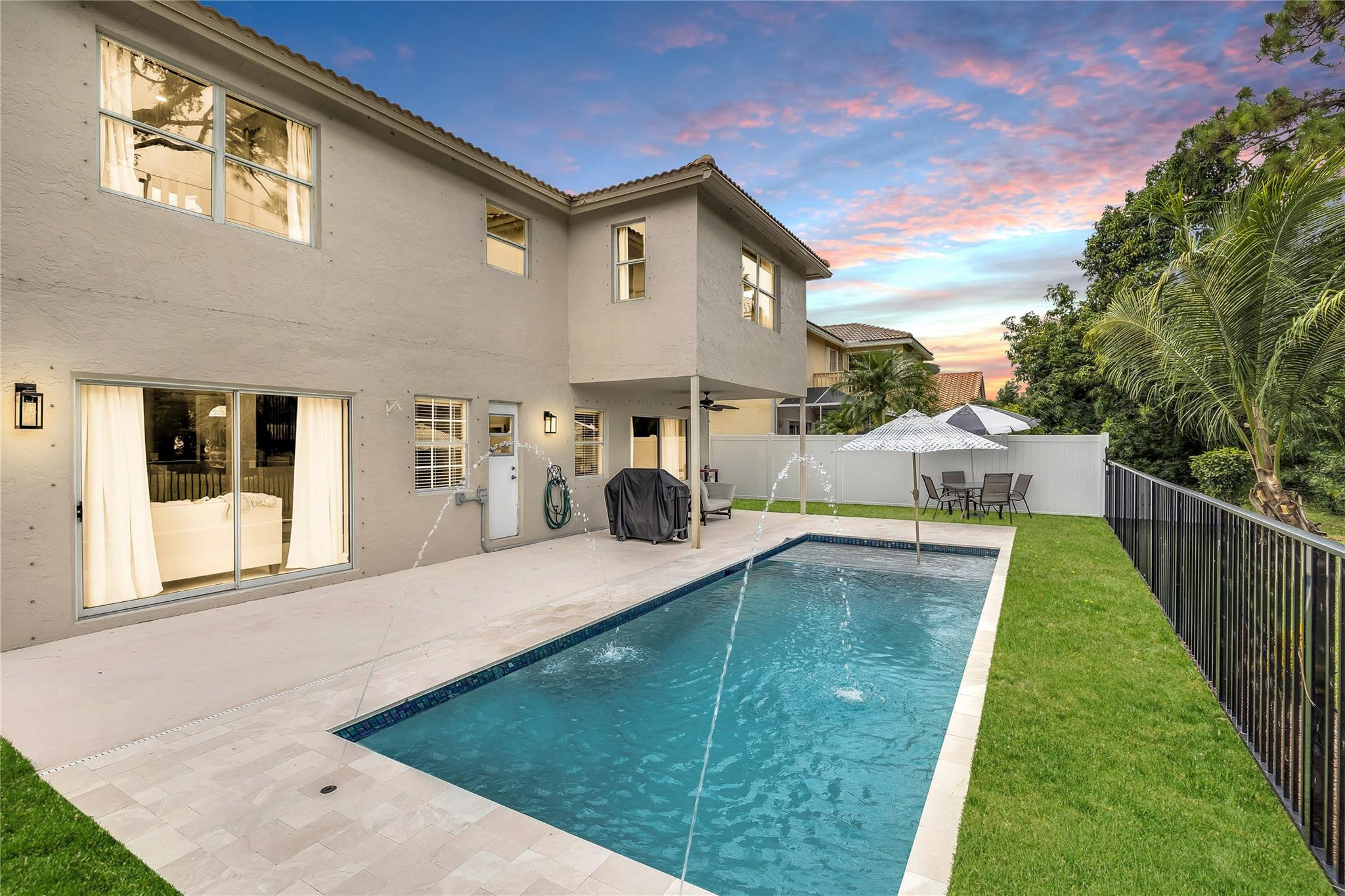 8613 Windy Circle Boynton Beach, FL 33472 - Photo 2 of 51 a view of a house with backyard and sitting area