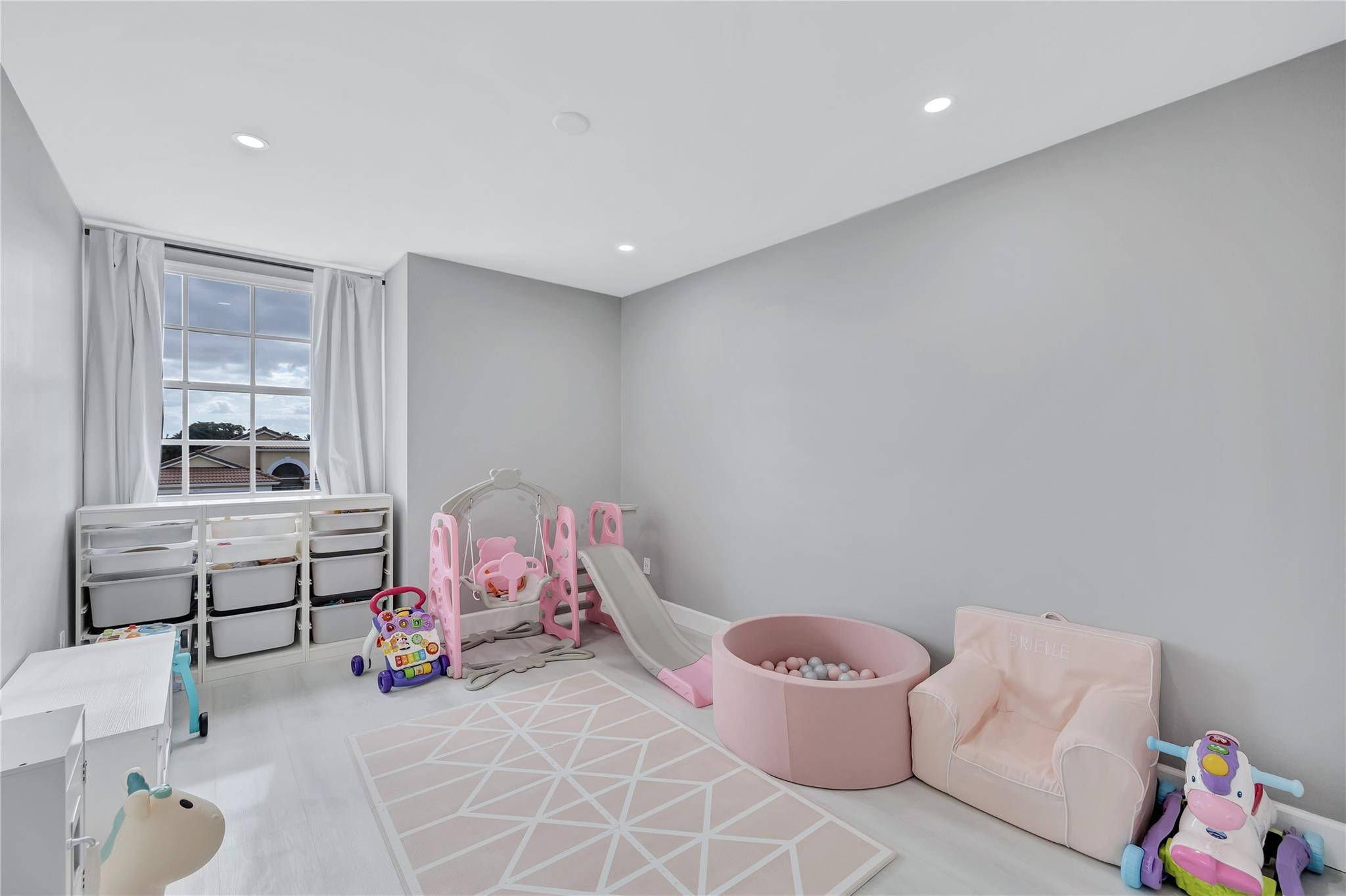 8613 Windy Circle Boynton Beach, FL 33472 - Photo 30 of 51 a bedroom with furniture and a window