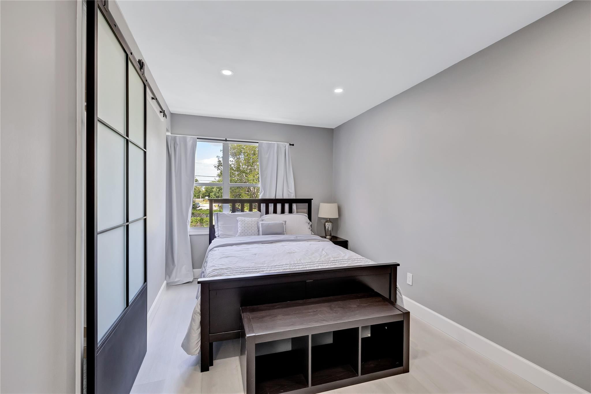 8613 Windy Circle Boynton Beach, FL 33472 - Photo 33 of 51 a view of a hallway with furniture and window