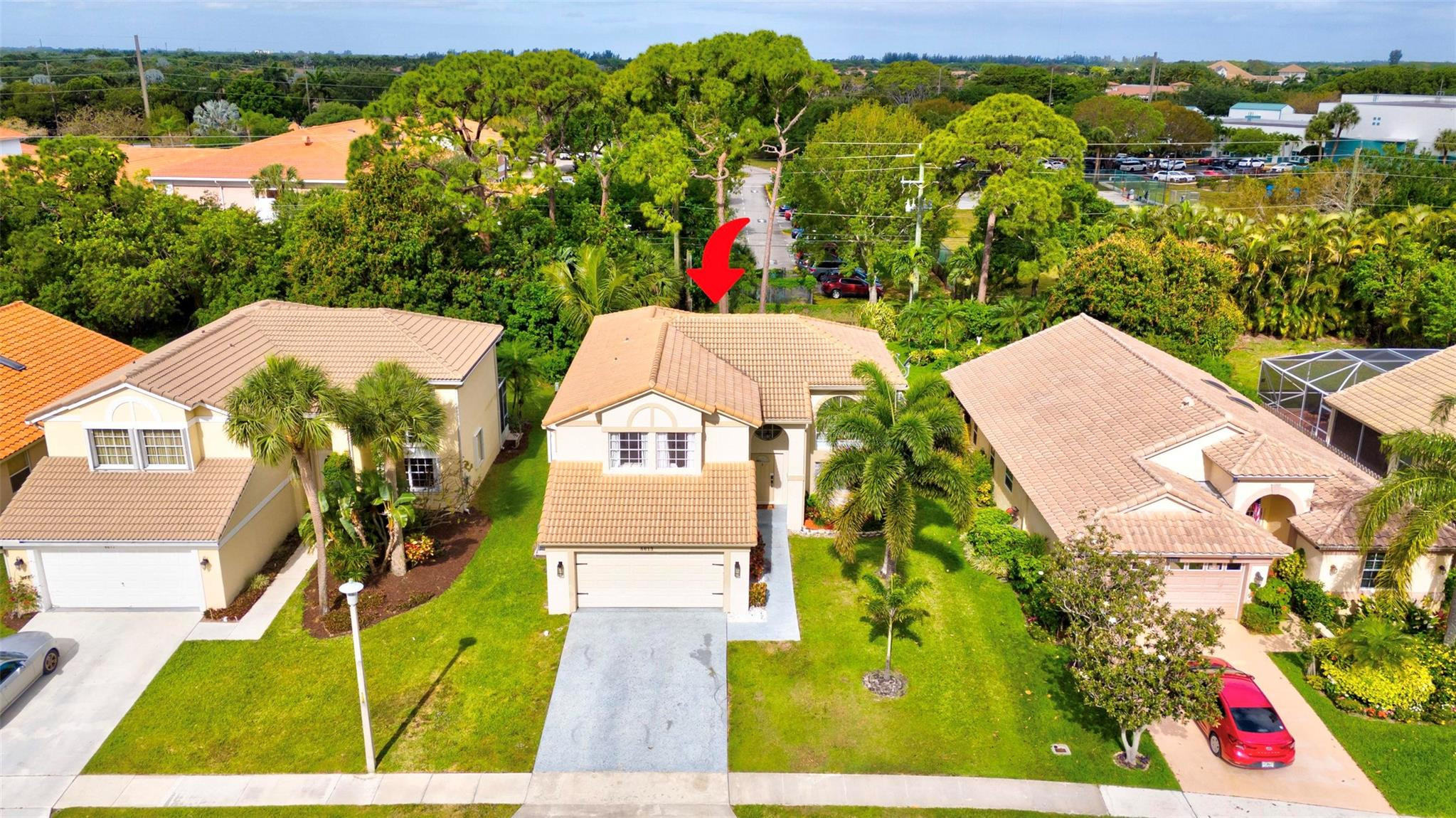 8613 Windy Circle Boynton Beach, FL 33472 - Photo 40 of 51 an aerial view of a house with a yard and pool