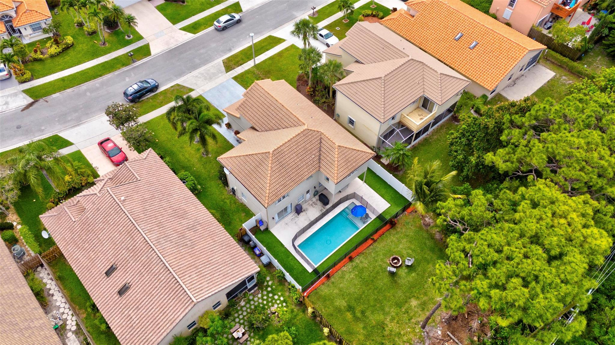 8613 Windy Circle Boynton Beach, FL 33472 - Photo 43 of 51 an aerial view of a house with swimming pool and outdoor space