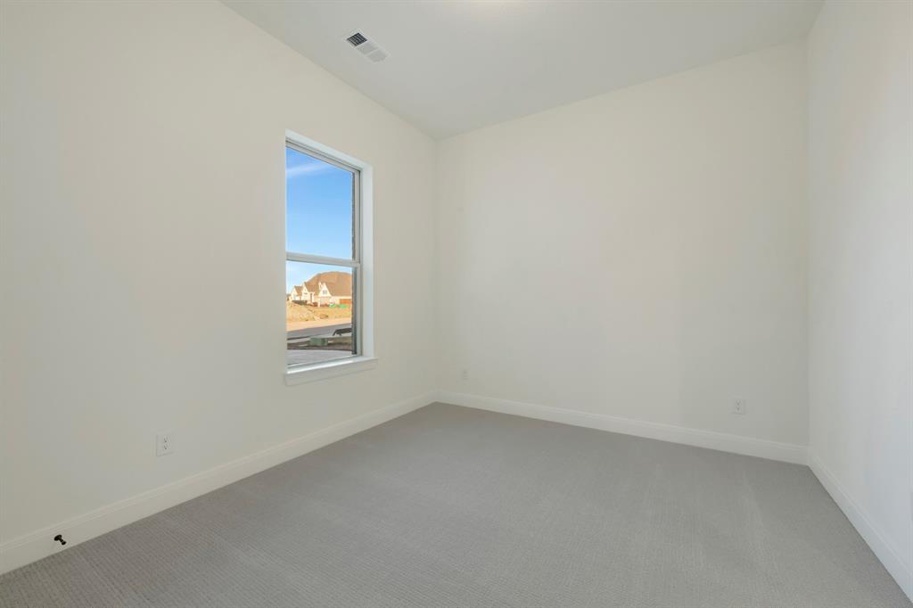 1941 Foothill Road Rockwall, TX 75087 - Photo 17 of 37 a view of an empty room with a window