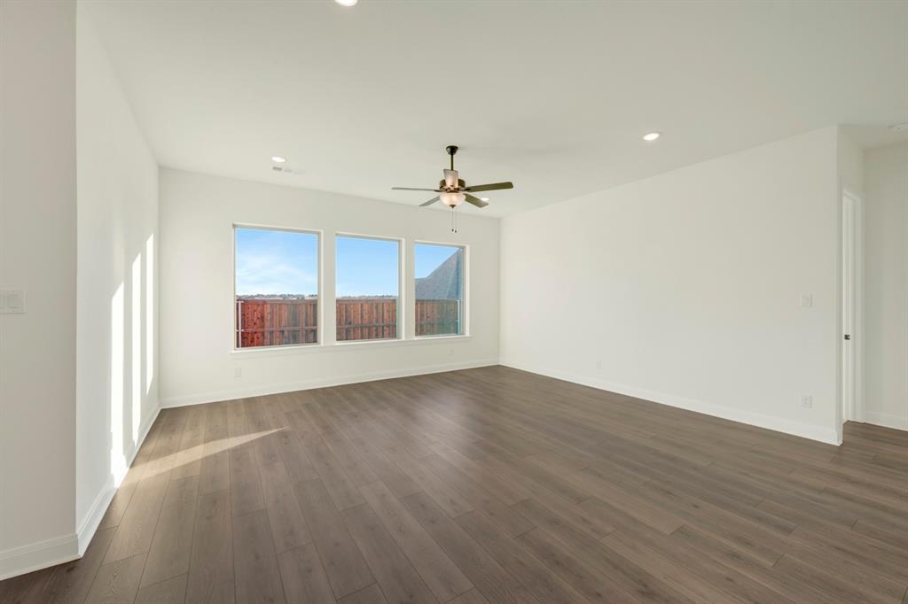 1941 Foothill Road Rockwall, TX 75087 - Photo 26 of 37 wooden floor in an empty room with a window