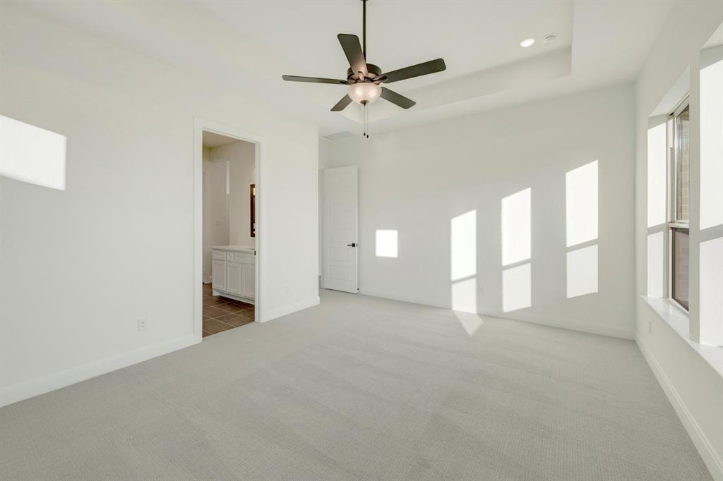 1941 Foothill Road Rockwall, TX 75087 - Photo 31 of 37 a view of a livingroom with a ceiling fan and window