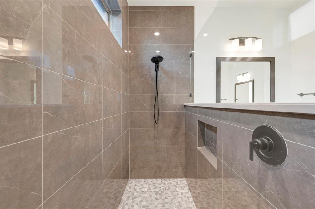 1941 Foothill Road Rockwall, TX 75087 - Photo 34 of 37 a bathroom with a sink a toilet and mirror