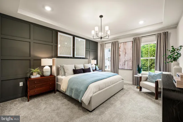 a bedroom with bed and window