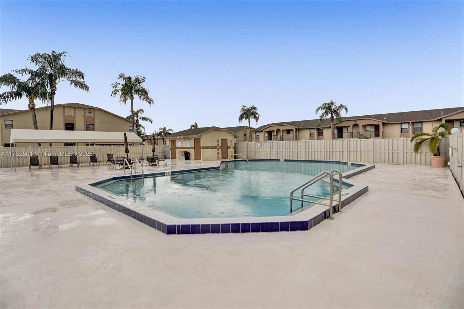 9395 Boca Cove Circle, Unit 1208 Boca Raton, FL 33428 - Photo 31 of 33 a view of balcony and dining room