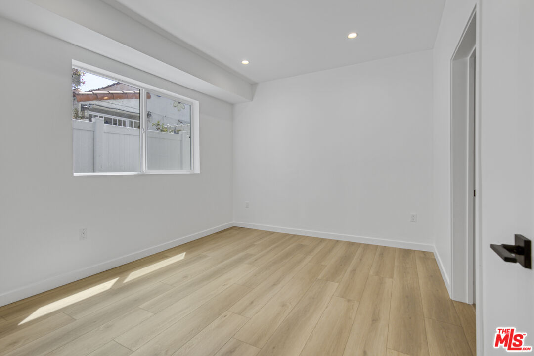 10828 Hesby Street North Hollywood, CA 91601 - Photo 23 of 33 wooden floor in an empty room