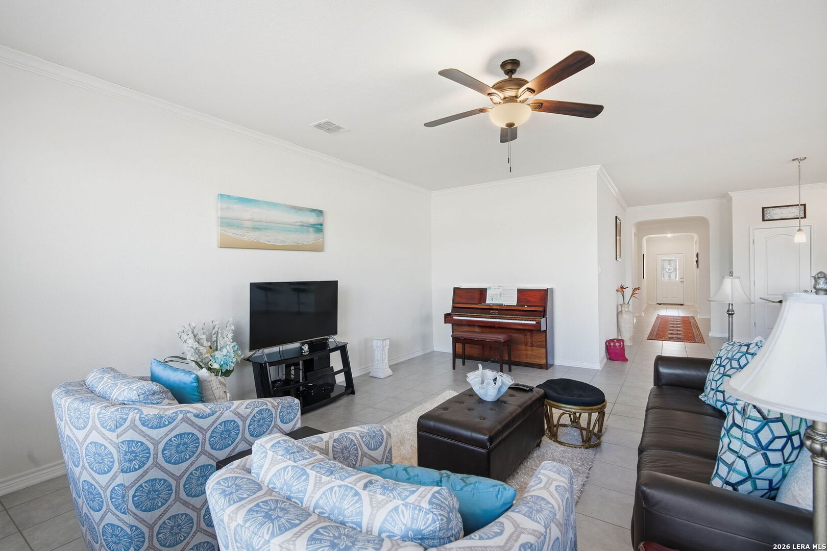 5103 Devanado Way San Antonio, TX 78261 - Photo 11 of 42 a living room with furniture and a flat screen tv with wooden floor