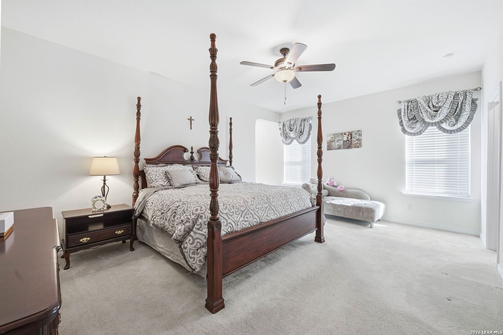 5103 Devanado Way San Antonio, TX 78261 - Photo 21 of 42 a bedroom with a bed and a chandelier