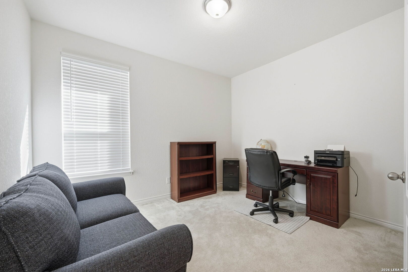 5103 Devanado Way San Antonio, TX 78261 - Photo 28 of 42 a view of a livingroom with workspace and a couch