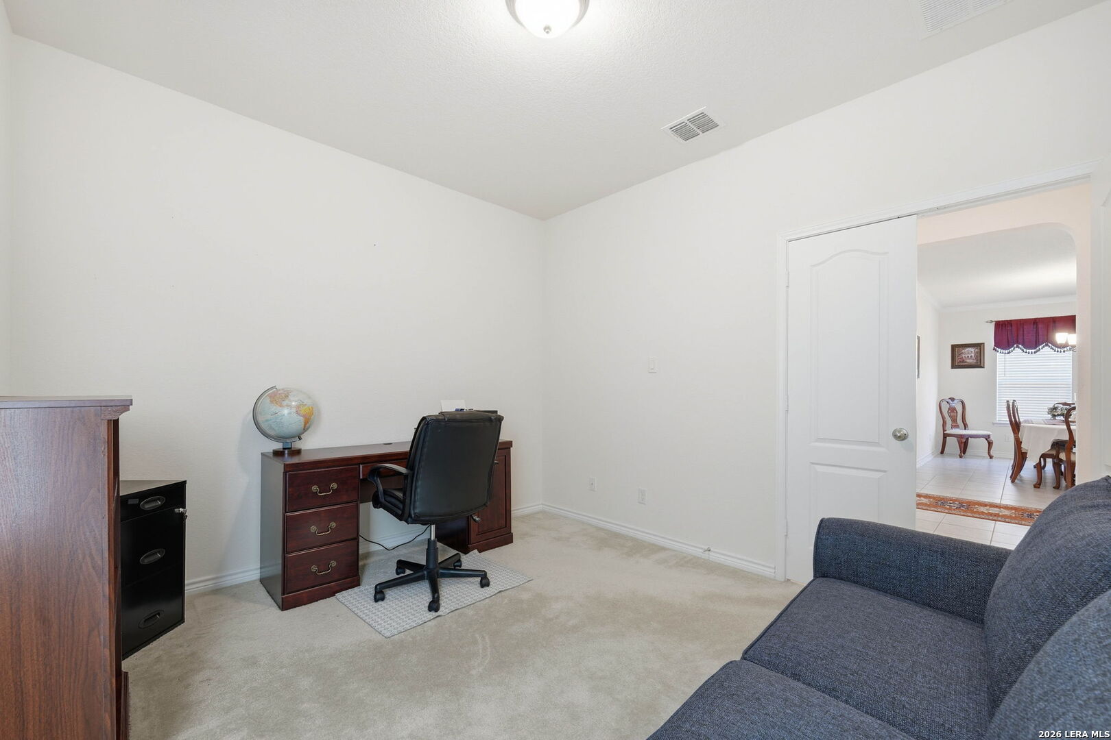 5103 Devanado Way San Antonio, TX 78261 - Photo 29 of 42 a view of livingroom with workspace and a couch