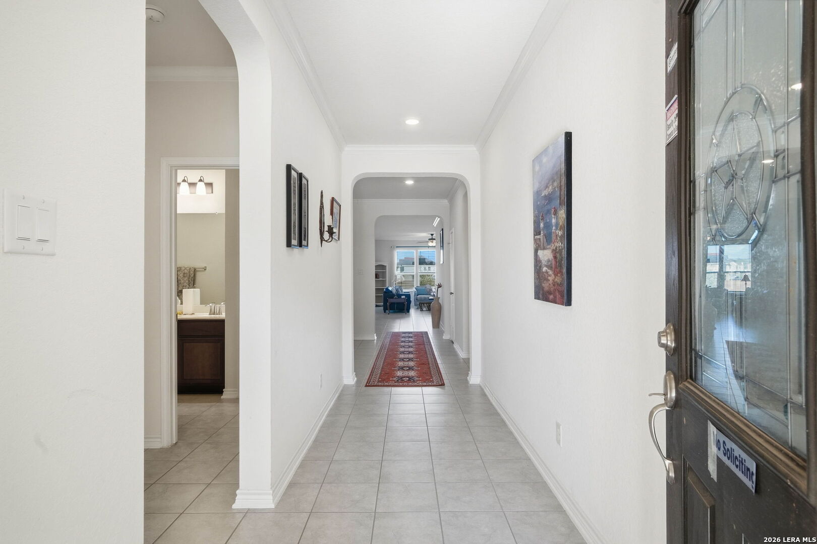 5103 Devanado Way San Antonio, TX 78261 - Photo 4 of 42 a view of a hallway with wooden shelves