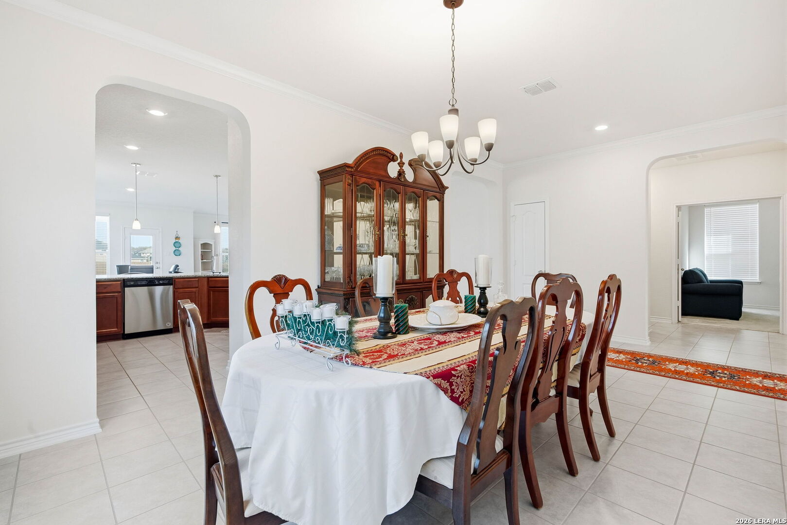5103 Devanado Way San Antonio, TX 78261 - Photo 7 of 42 a dining room filled chandelier and wooden floor