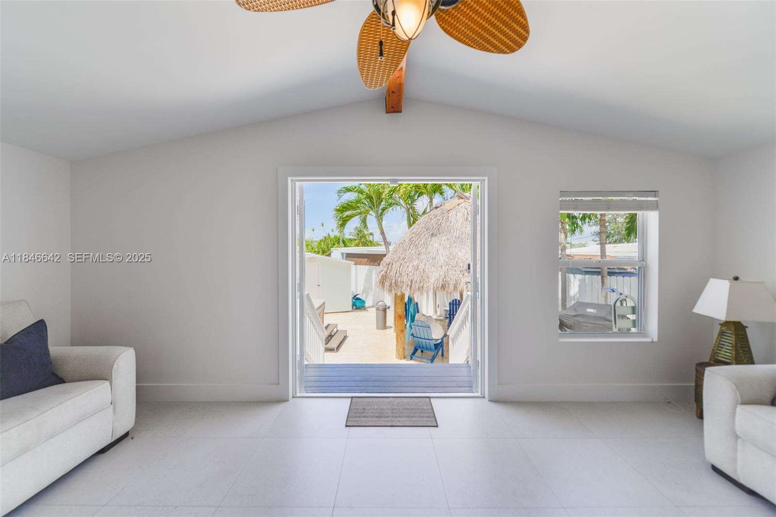 11 Mockingbird Road Key Largo, FL 33037 - Photo 13 of 44 a view of livingroom with furniture and window