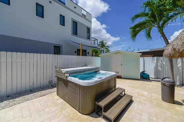 a view of a backyard with plants
