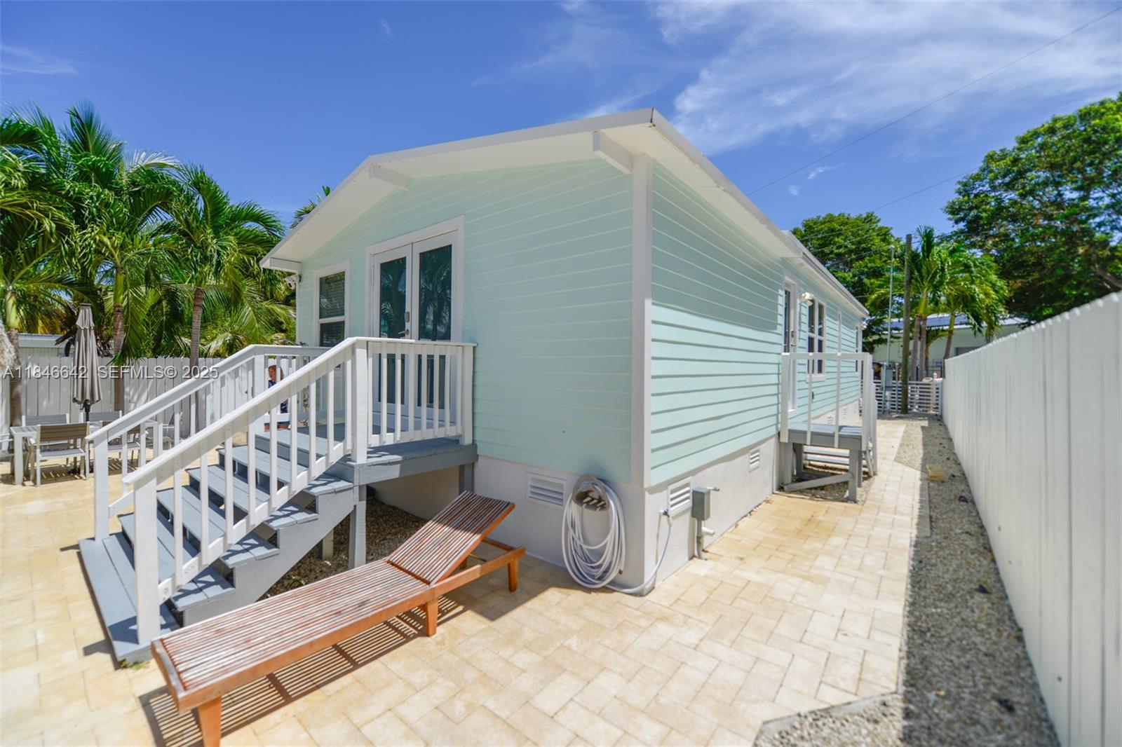 11 Mockingbird Road Key Largo, FL 33037 - Photo 40 of 44 a view of deck with patio