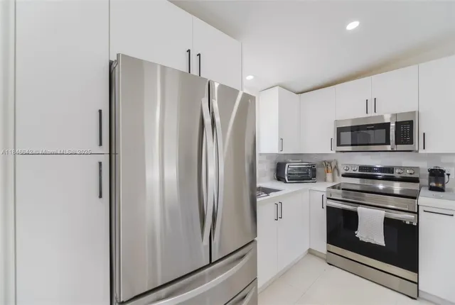 a bedroom with furniture and a ceiling fan