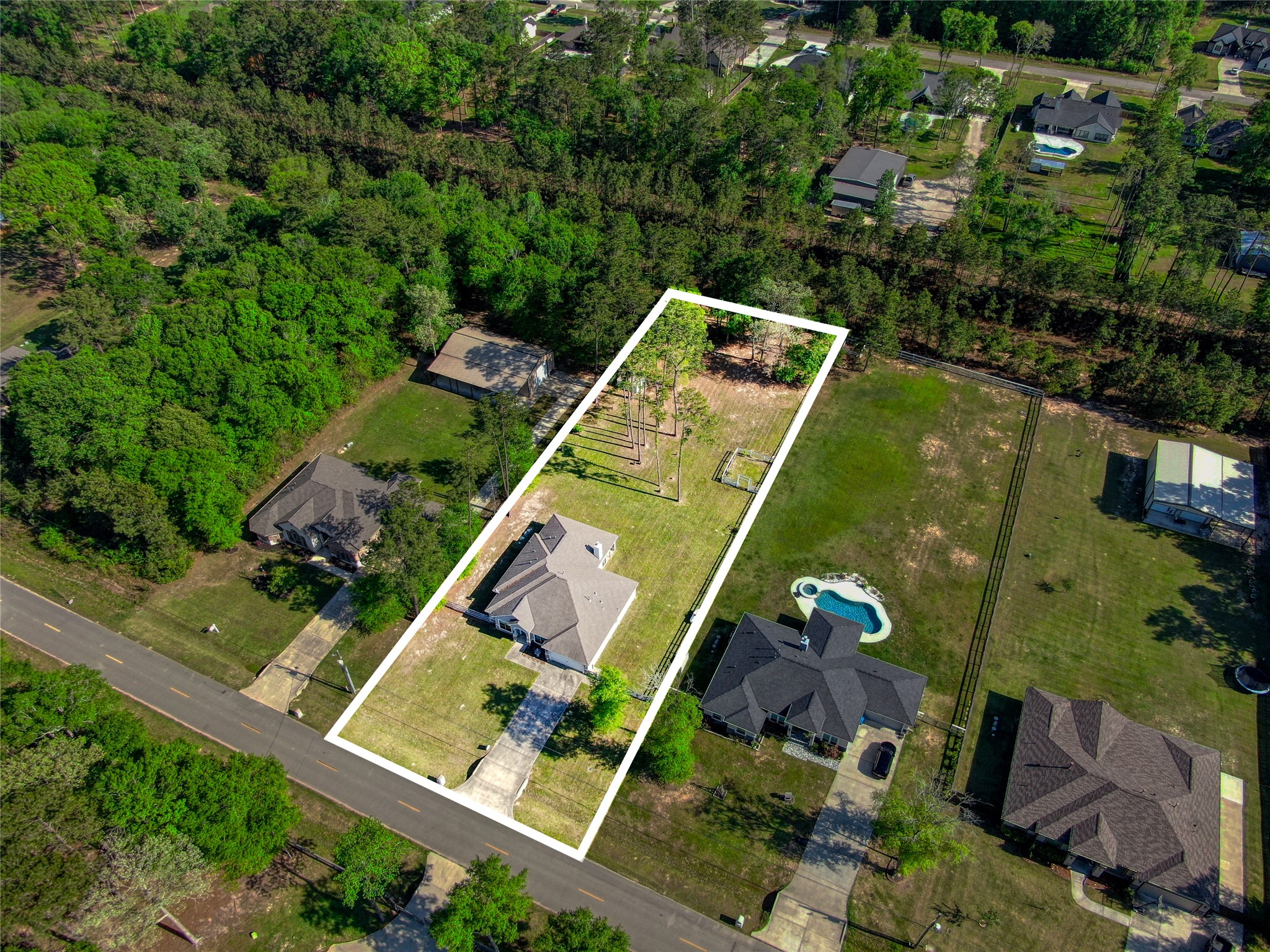 27684 Rio Blanco Drive Splendora, TX 77372 - Photo 29 of 31 an aerial view of house with yard