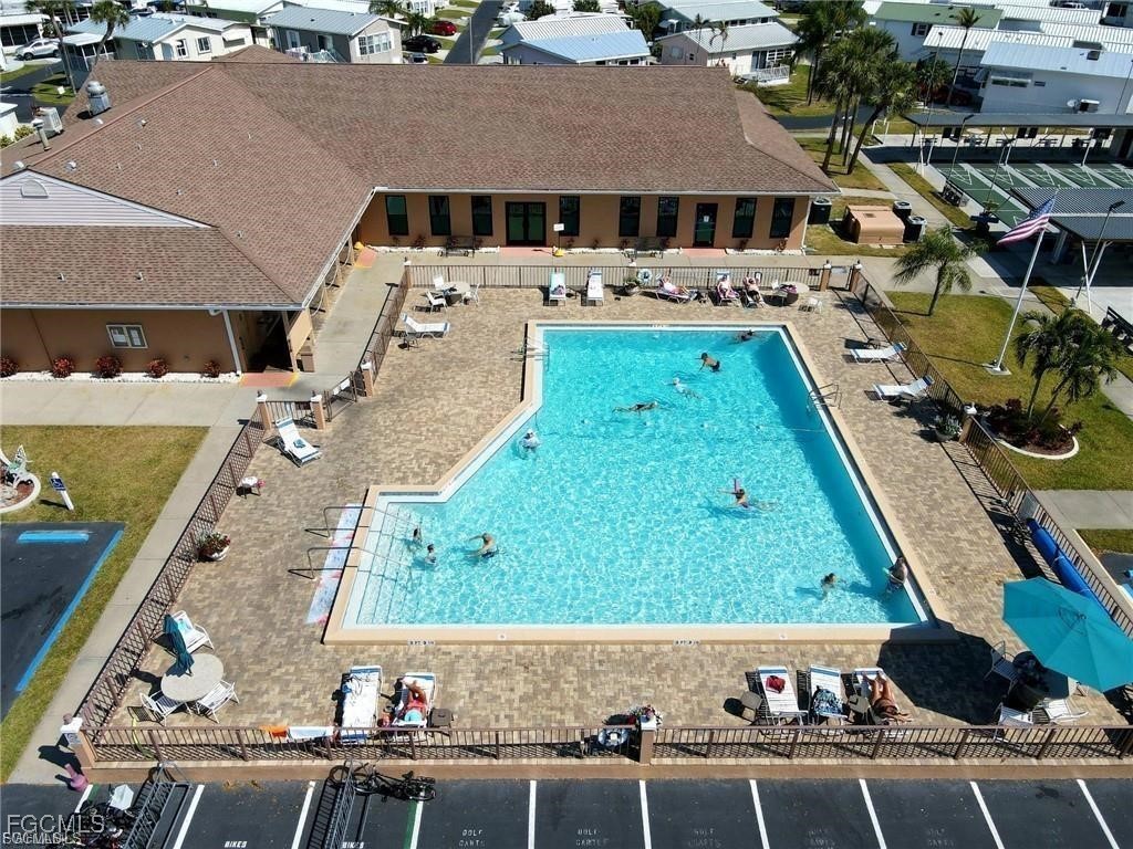 19681 Summerlin Road, Unit 493 Fort Myers, FL 33908 - Photo 4 of 8 an aerial view of a house with a yard