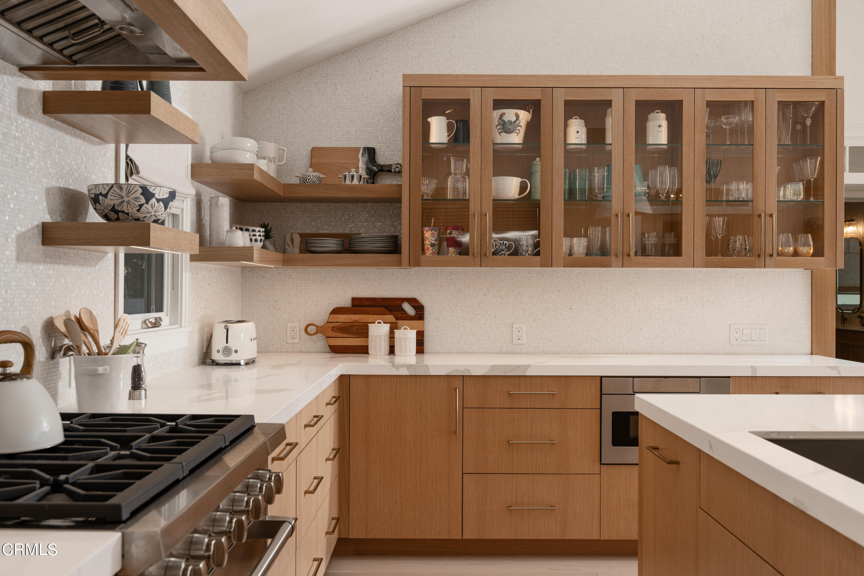 330 Salida Del Sol Santa Barbara, CA 93109 - Photo 12 of 39 a kitchen with a stove and a sink