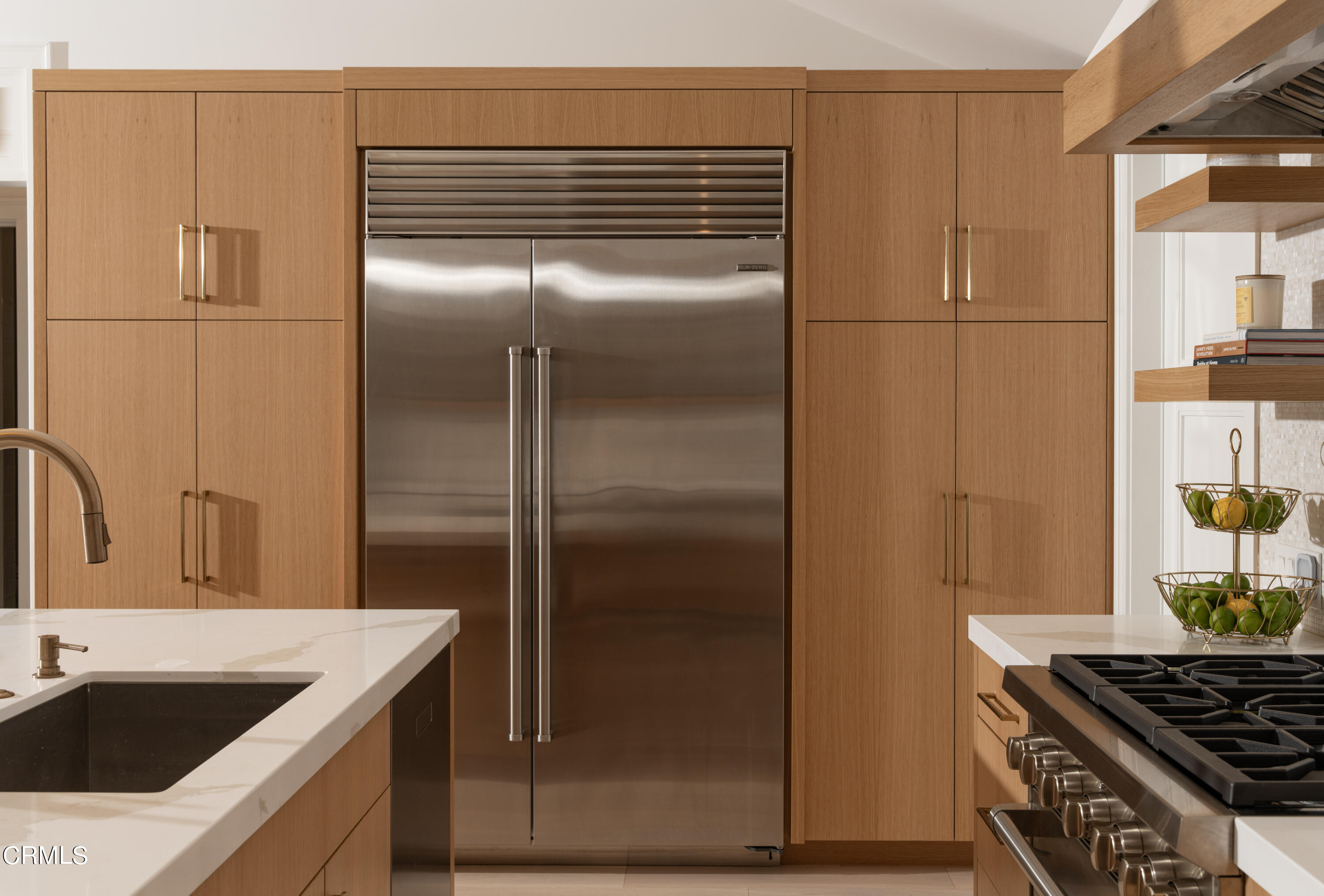 330 Salida Del Sol Santa Barbara, CA 93109 - Photo 13 of 39 a kitchen with a refrigerator and a sink