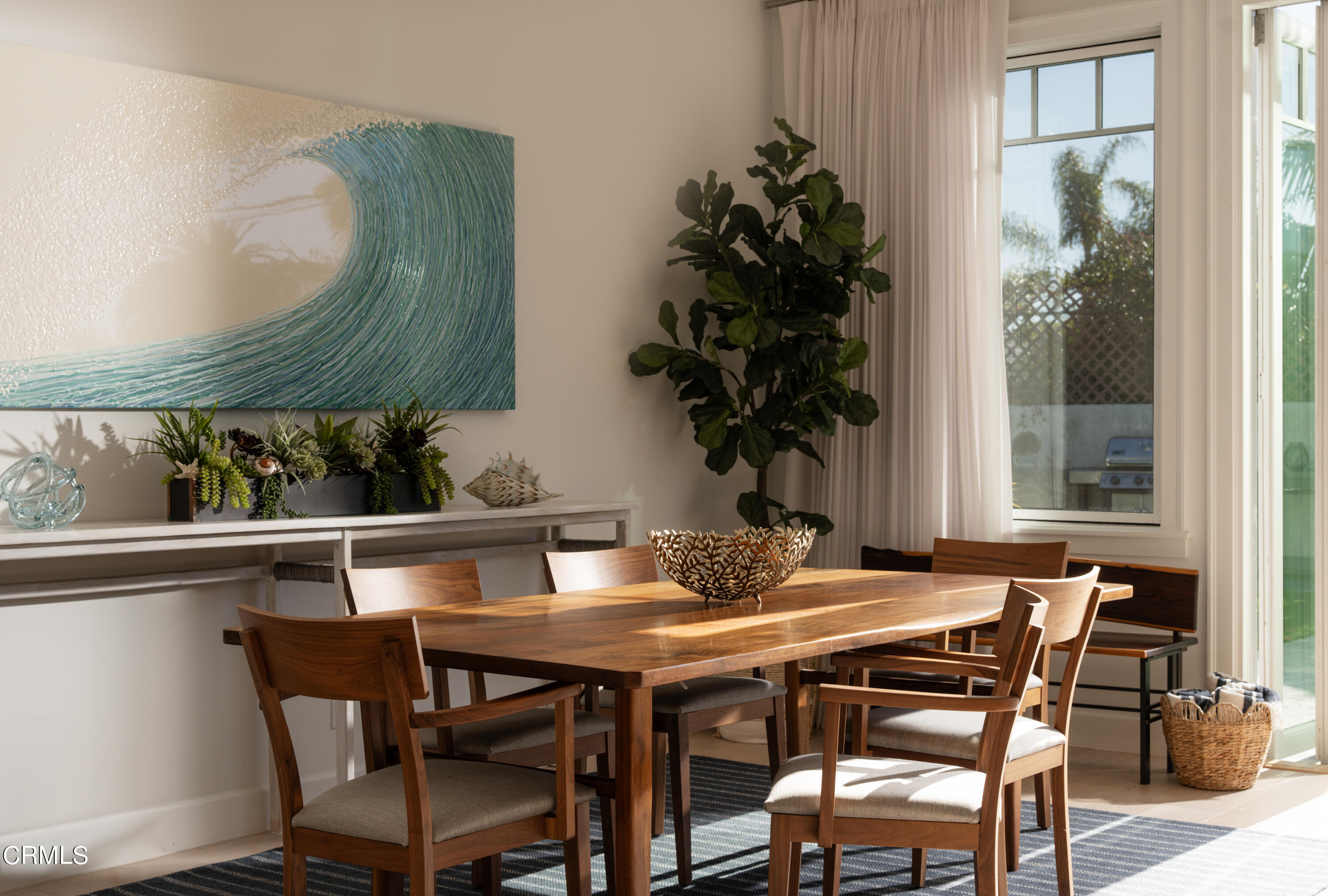 330 Salida Del Sol Santa Barbara, CA 93109 - Photo 17 of 39 a dining room with furniture and window