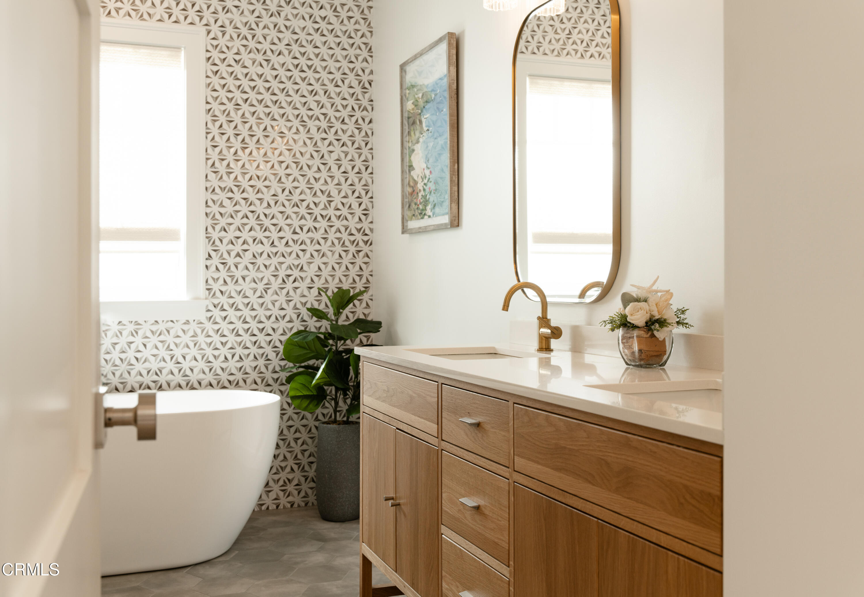 330 Salida Del Sol Santa Barbara, CA 93109 - Photo 23 of 39 a bathroom with a sink and a mirror