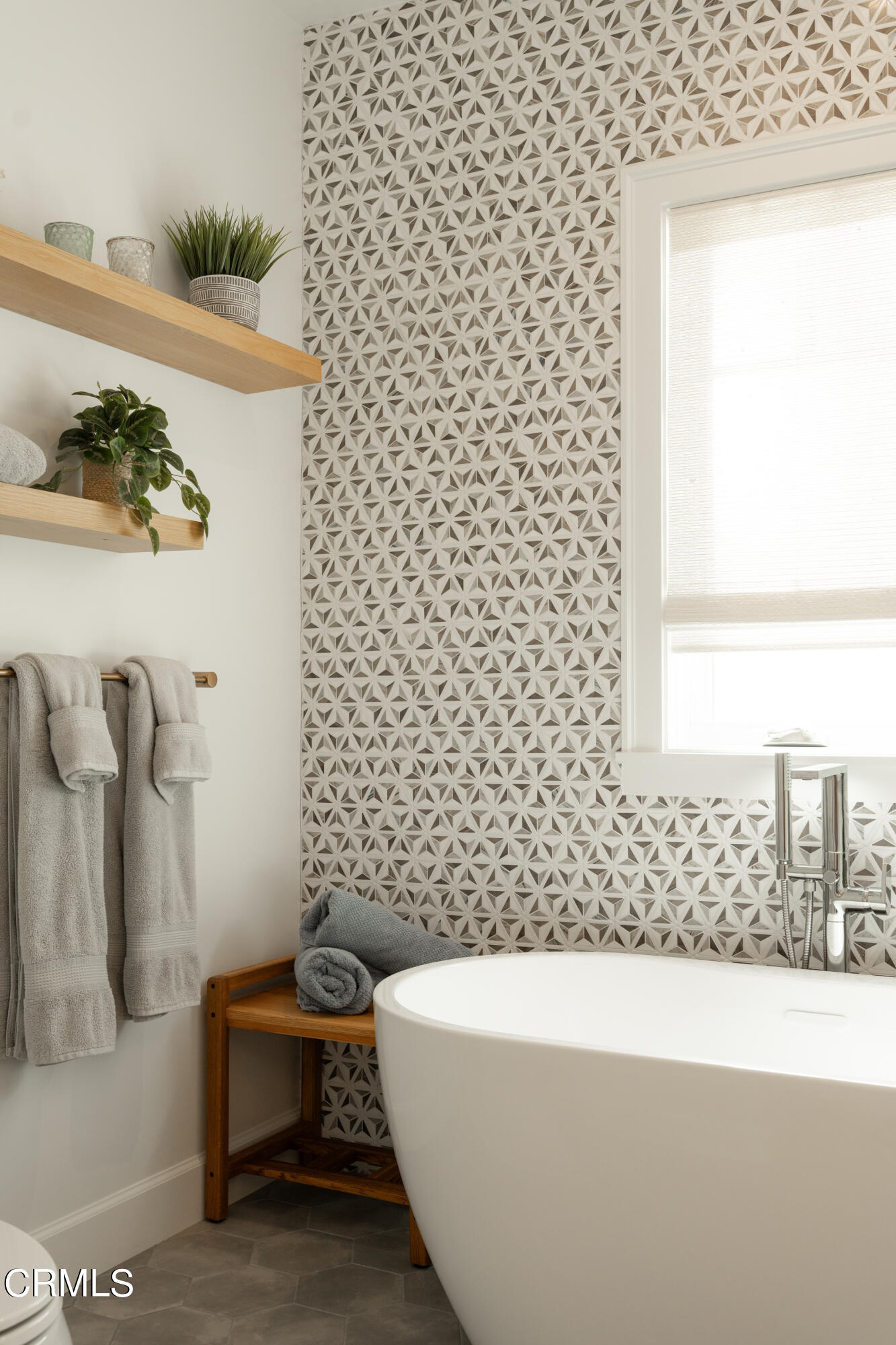 330 Salida Del Sol Santa Barbara, CA 93109 - Photo 25 of 39 a bathroom with a bathtub and a shower