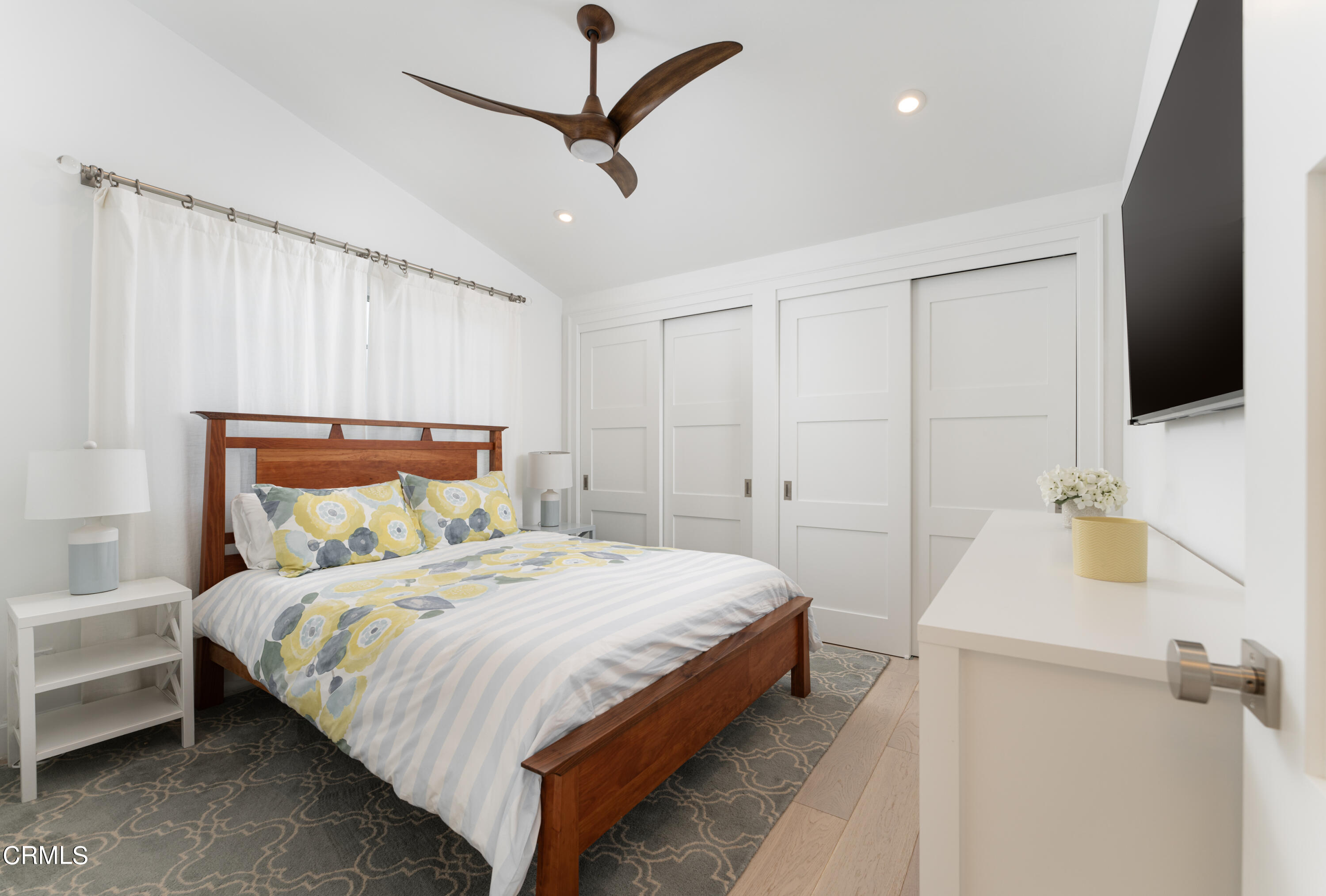 330 Salida Del Sol Santa Barbara, CA 93109 - Photo 27 of 39 a bedroom with a bed and a flat screen tv