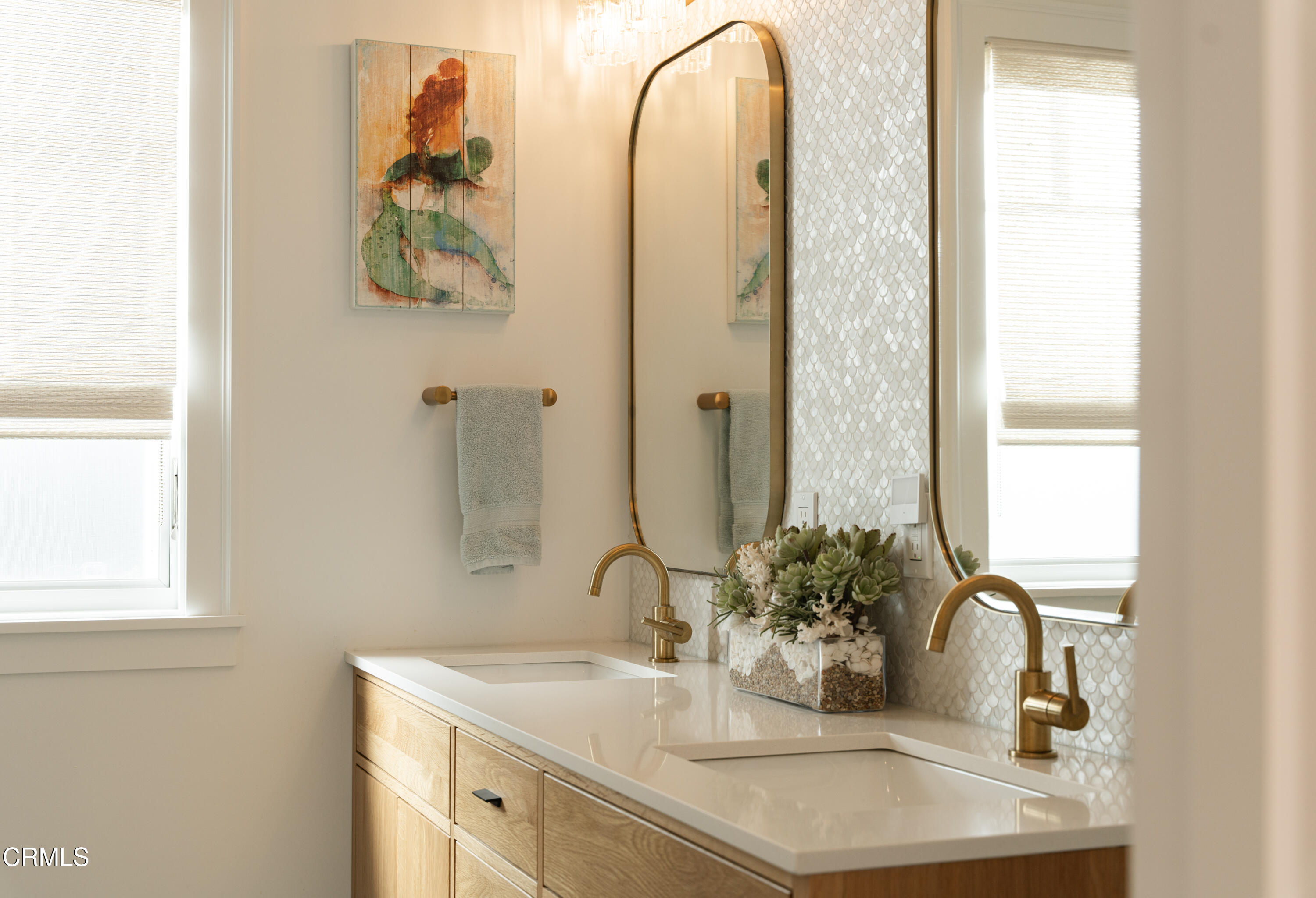 330 Salida Del Sol Santa Barbara, CA 93109 - Photo 30 of 39 a bathroom with a sink and a mirror