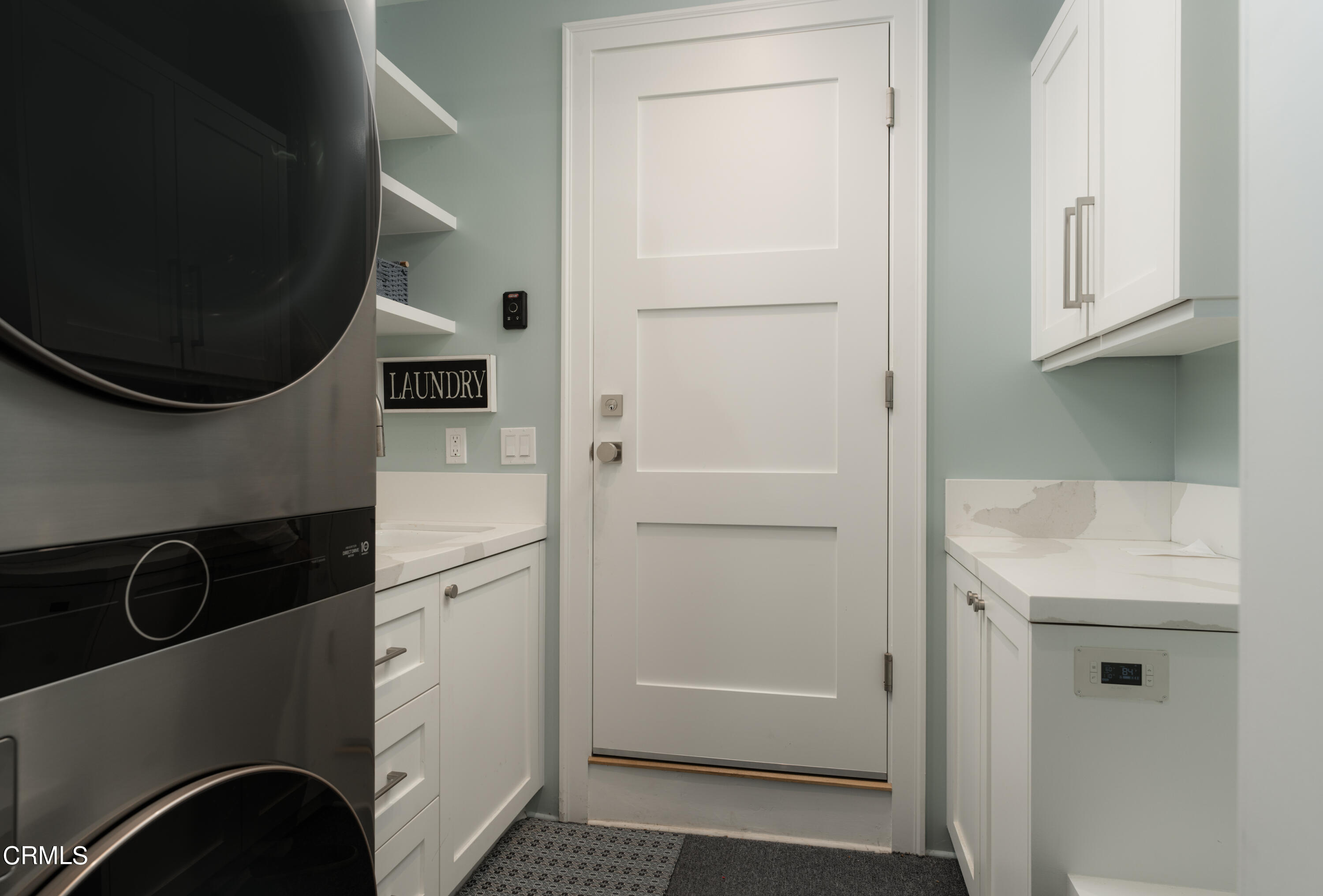 330 Salida Del Sol Santa Barbara, CA 93109 - Photo 31 of 39 a utility room with dryer and washer
