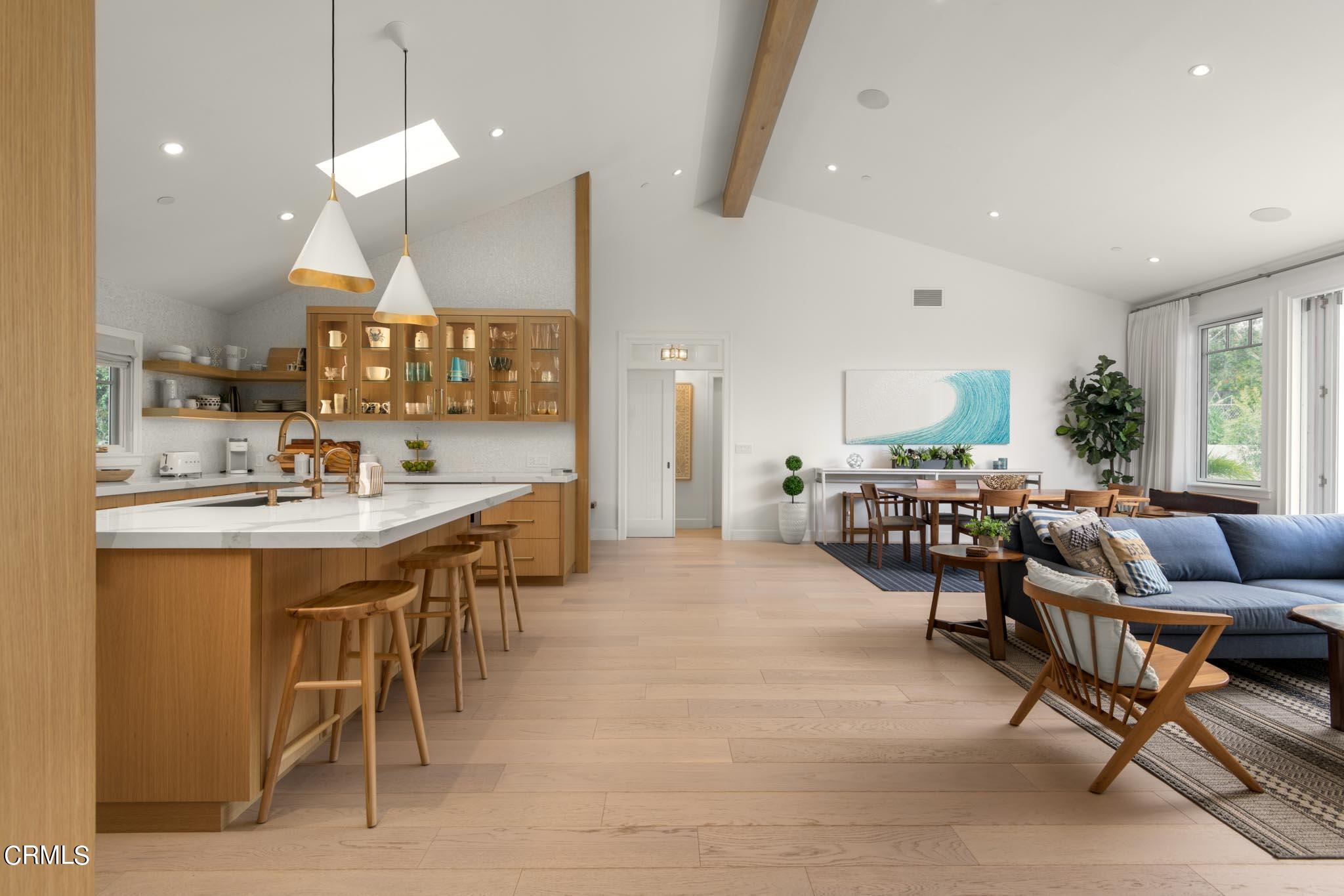 330 Salida Del Sol Santa Barbara, CA 93109 - Photo 5 of 39 a large kitchen with a table and chairs