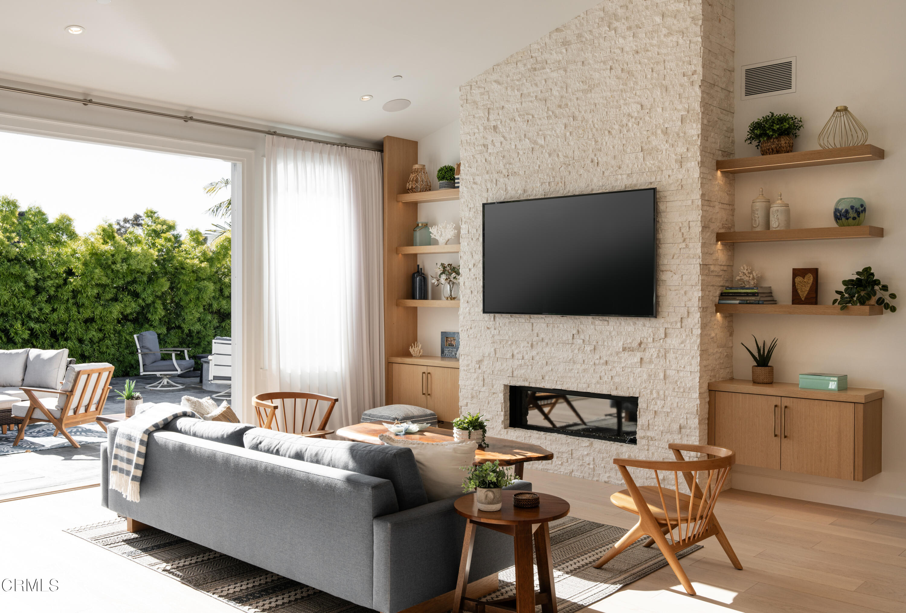 330 Salida Del Sol Santa Barbara, CA 93109 - Photo 6 of 39 a living room with furniture and a flat screen tv