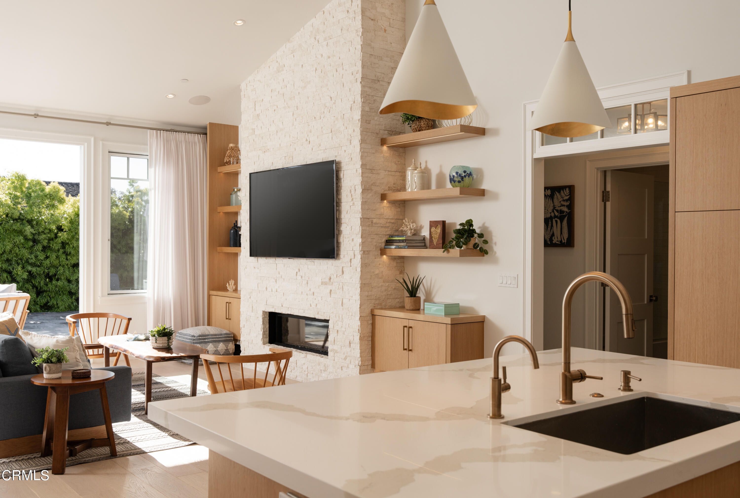 330 Salida Del Sol Santa Barbara, CA 93109 - Photo 10 of 39 a living room with fireplace furniture and a flat screen tv