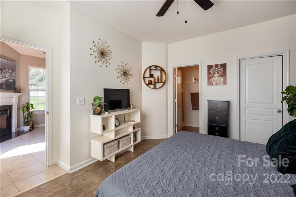 206 Dawn Mist Lane, Unit 28 Fort Mill, SC 29708 - Photo 17 of 39 a bedroom with furniture and a window