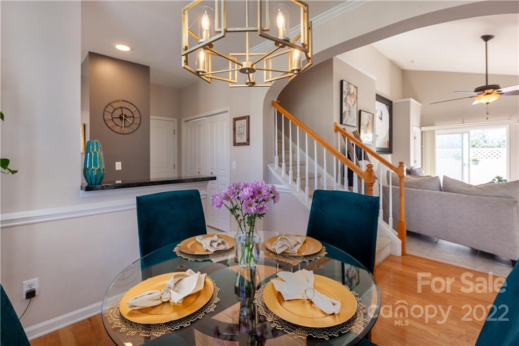 206 Dawn Mist Lane, Unit 28 Fort Mill, SC 29708 - Photo 10 of 39 a view of a dining room with furniture