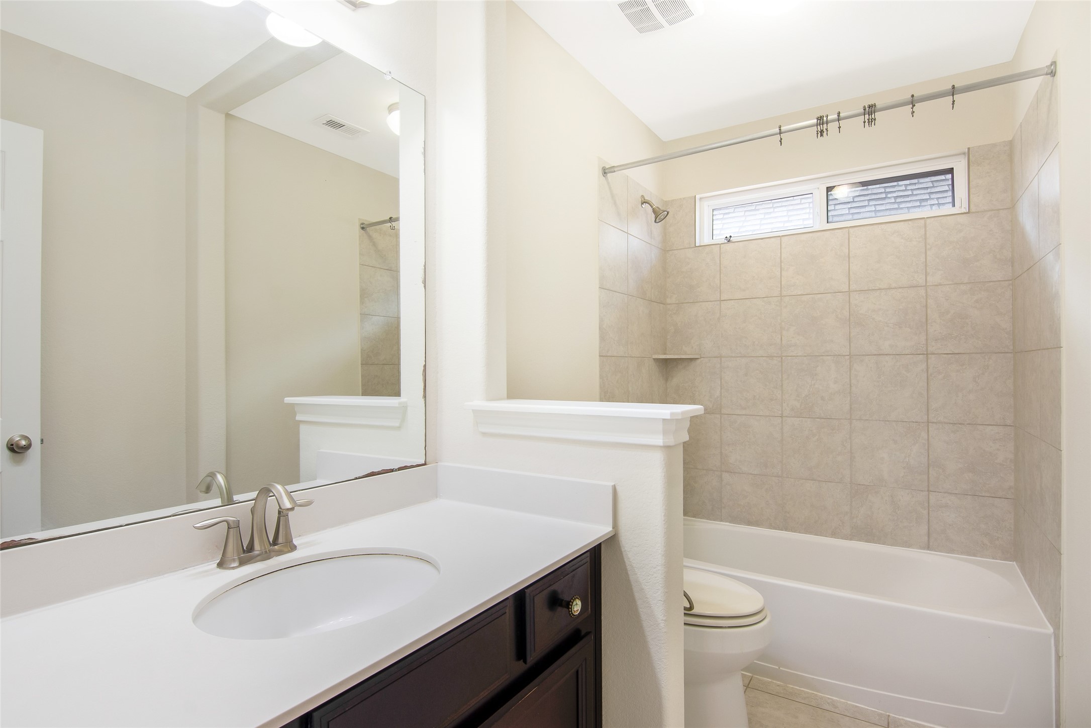 19906 Durwood Pines Lane Cypress, TX 77433 - Photo 16 of 26 a bathroom with a sink a toilet and shower