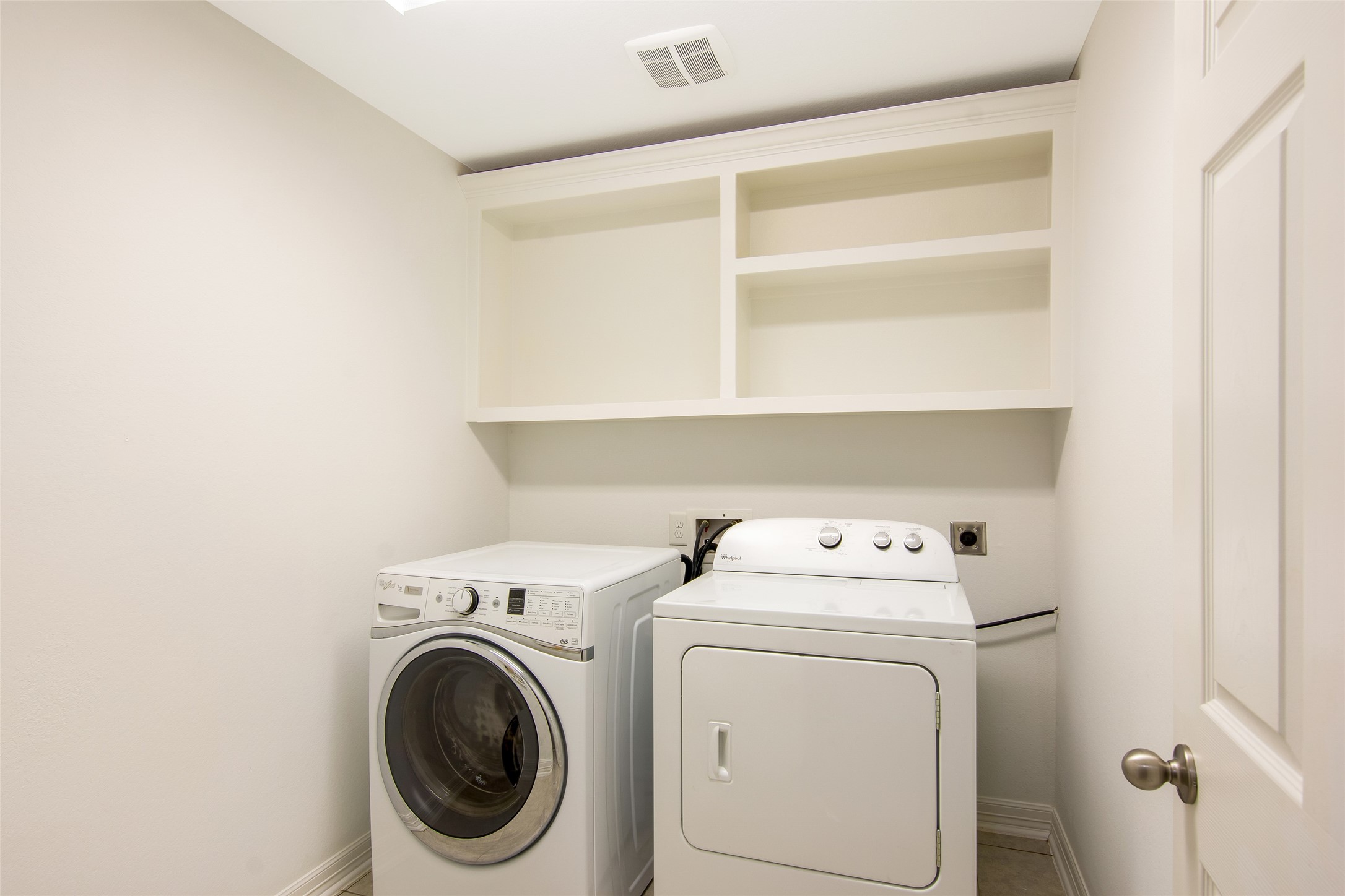 19906 Durwood Pines Lane Cypress, TX 77433 - Photo 19 of 26 a utility room with dryer and washer