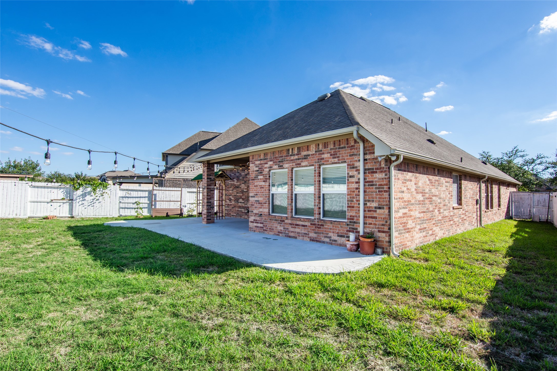 19906 Durwood Pines Lane Cypress, TX 77433 - Photo 20 of 26 a view of a house with backyard and porch