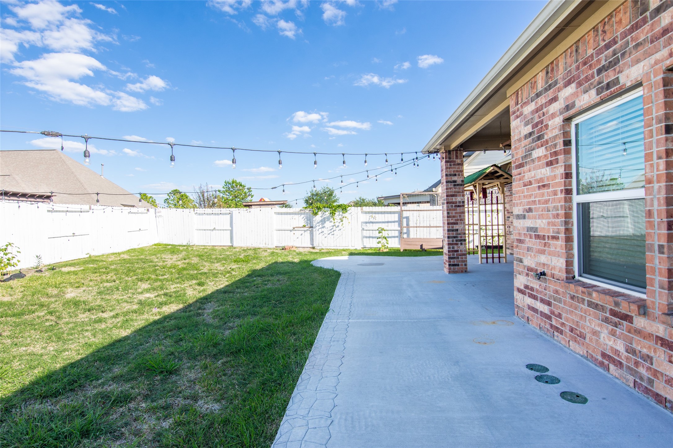 19906 Durwood Pines Lane Cypress, TX 77433 - Photo 24 of 26 a view of a porch with a back yard