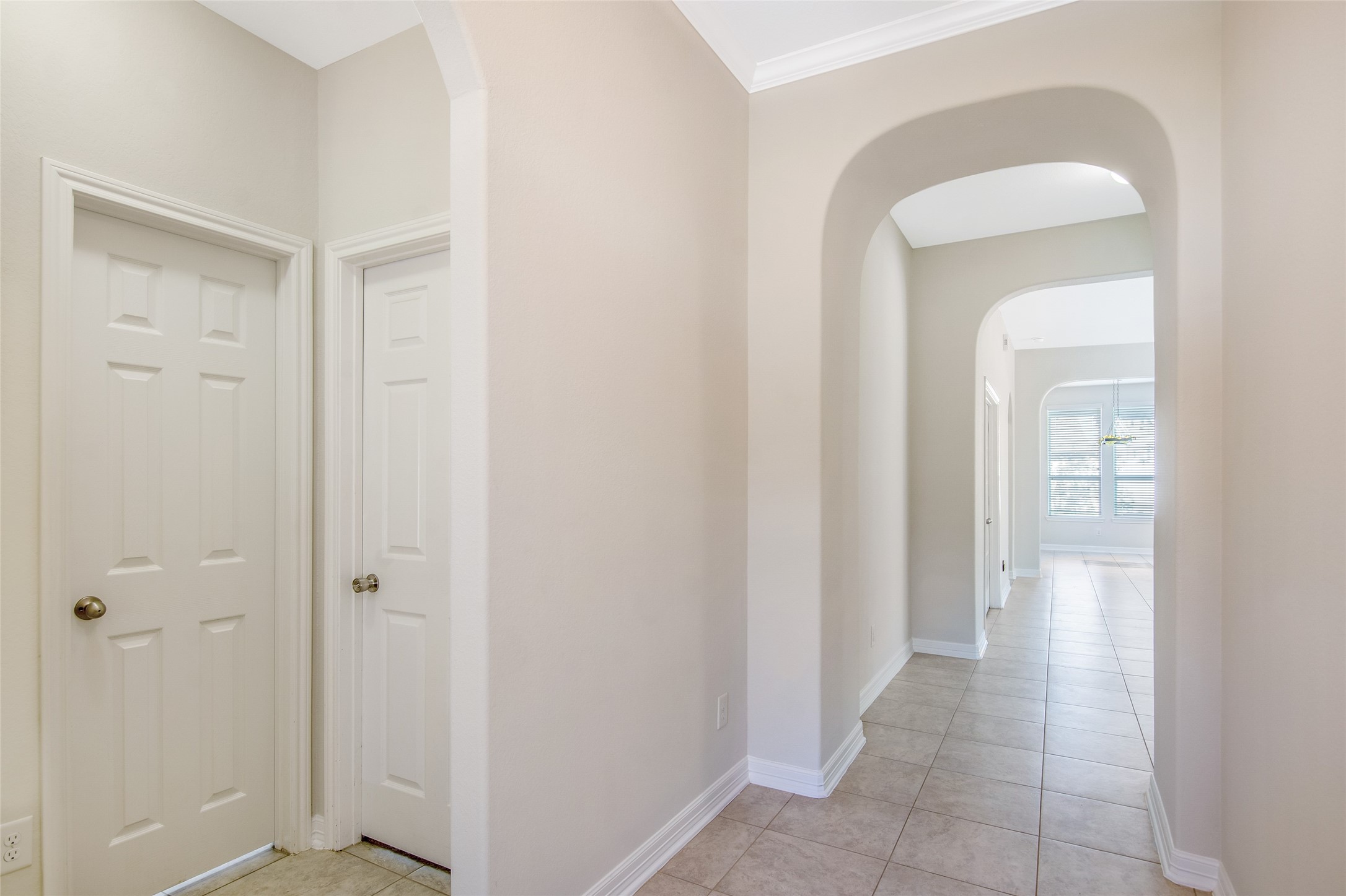 19906 Durwood Pines Lane Cypress, TX 77433 - Photo 3 of 26 a view of a hallway with a wooden floor