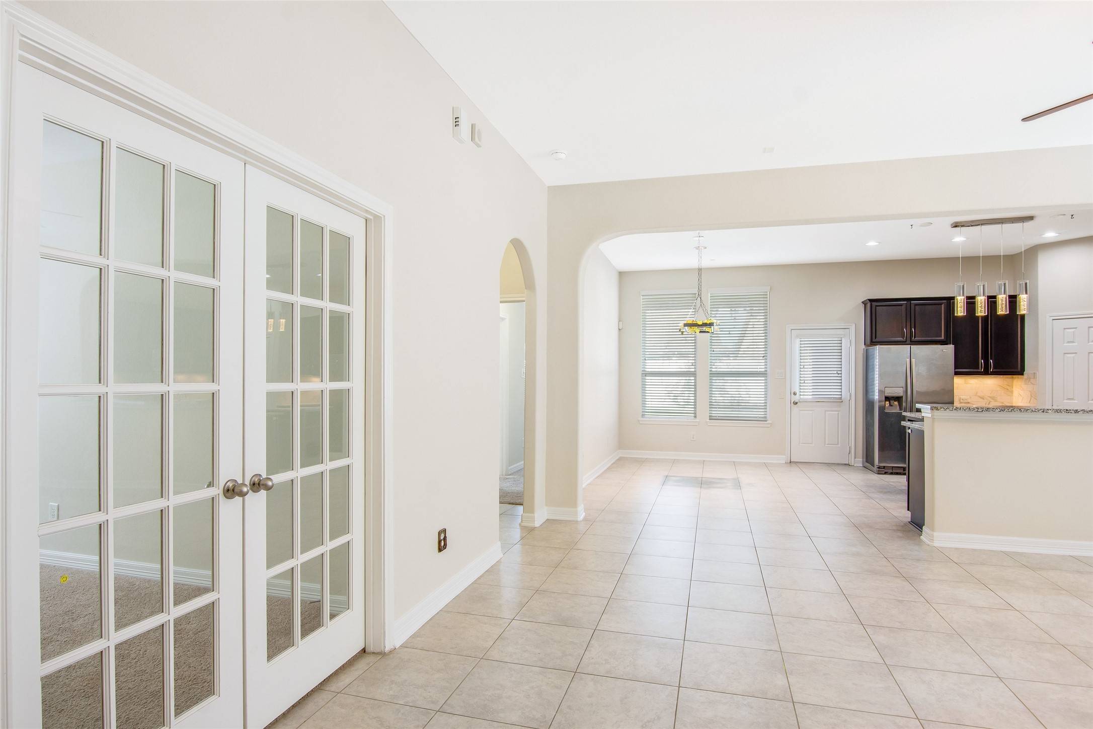 19906 Durwood Pines Lane Cypress, TX 77433 - Photo 5 of 26 a view of a entryway with kitchen and windows